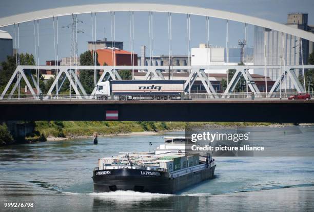 The container barge La Primavera passes Kehl, Germany, 22 August 2017. Goods are currently being transported on barges on the Rhine that would...