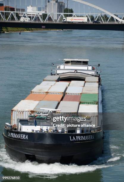 The container barge La Primavera passes Kehl, Germany, 22 August 2017. Goods are currently being transported on barges on the Rhine that would...