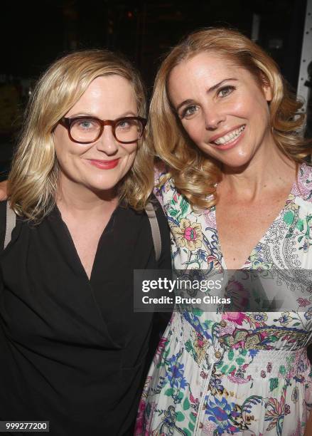 Amy Poehler and Kerry Butler pose backstage at the hit musical based on the film "Mean Girls" on Broadway at The August Wilson Theatre on July 14,...