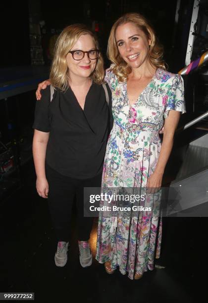 Amy Poehler and Kerry Butler pose backstage at the hit musical based on the film "Mean Girls" on Broadway at The August Wilson Theatre on July 14,...