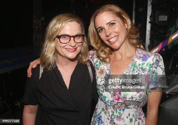 Amy Poehler and Kerry Butler pose backstage at the hit musical based on the film "Mean Girls" on Broadway at The August Wilson Theatre on July 14,...