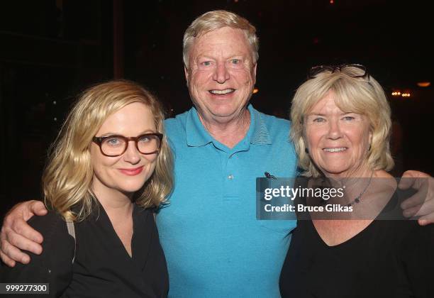 Amy Poehler poses with her parents William Poehler and Eileen Poehler backstage at the hit musical based on the film "Mean Girls" on Broadway at The...