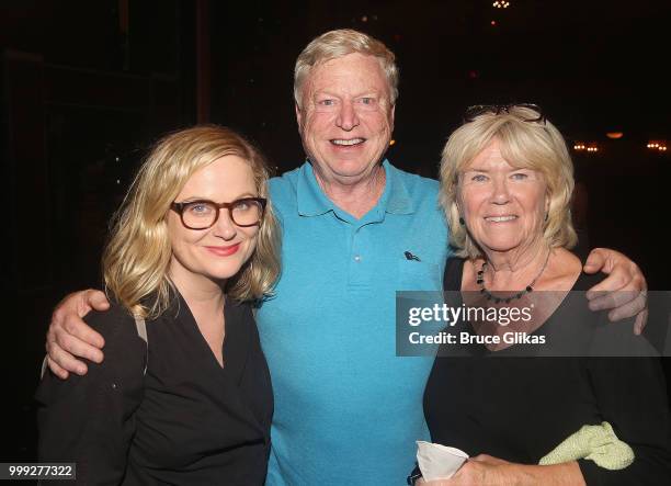 Amy Poehler poses with her parents William Poehler and Eileen Poehler backstage at the hit musical based on the film "Mean Girls" on Broadway at The...