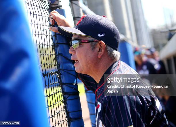 Manager Tsutomu Ikuta of Japan watches the Haarlem Baseball Week game between Chinese Taipei and Japan at the Pim Mulier honkbalstadion on July 14,...