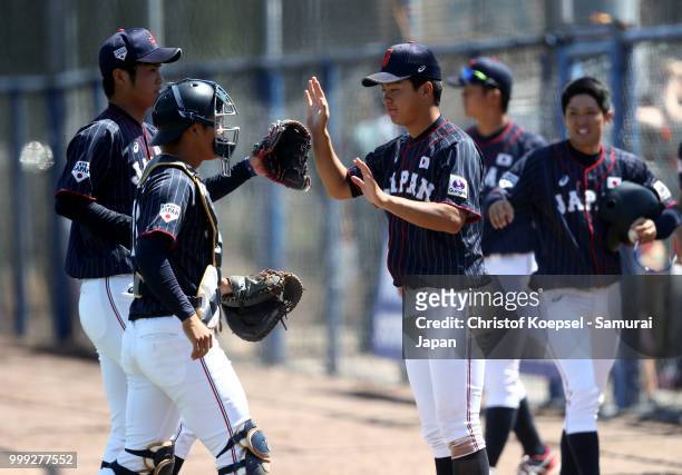 The team of Japan celebrates during the Haarlem Baseball Week game between Chinese Taipei and Japan at the Pim Mulier honkbalstadion on July 14, 2018...