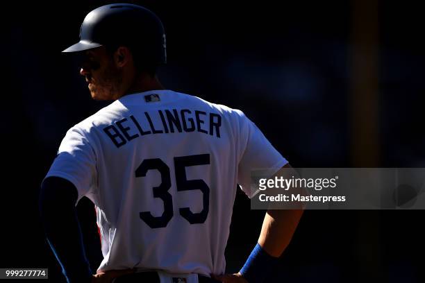 Cody Bellinger of the Los Angeles Dodgers looks on during the MLB game against the Los Angeles Angels at Dodger Stadium on July 14, 2018 in Los...