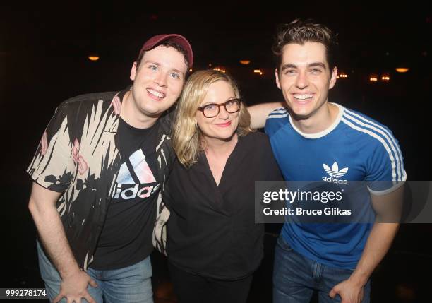 Grey Henson, Amy Poehler and Kyle Selig pose backstage at the hit musical based on the film "Mean Girls" on Broadway at The August Wilson Theatre on...