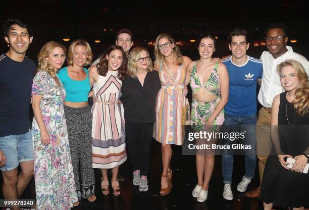 Amy Poehler poses with the cast backstage at the hit musical based on the film "Mean Girls" on Broadway at The August Wilson Theatre on July 14, 2018...