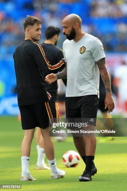 Adnan Januzaj of Belgium talks to assistant coach Thierry Henry before the 2018 FIFA World Cup Russia 3rd Place Playoff match between Belgium and...