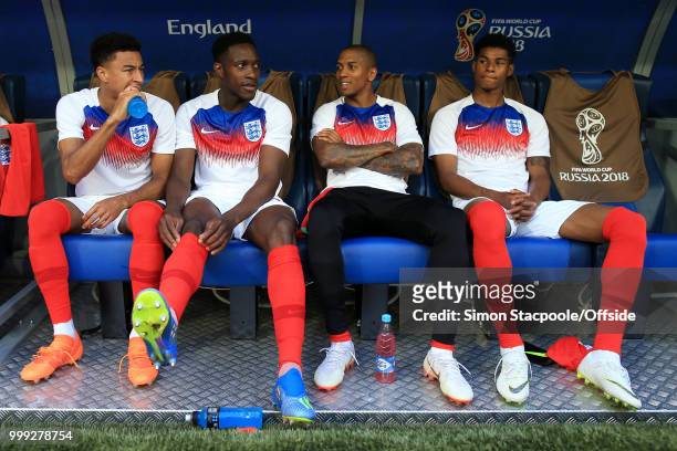 England substitutes Jesse Lingard , Danny Welbeck , Ashley Young and Marcus Rashford look on from the dugout during the 2018 FIFA World Cup Russia...