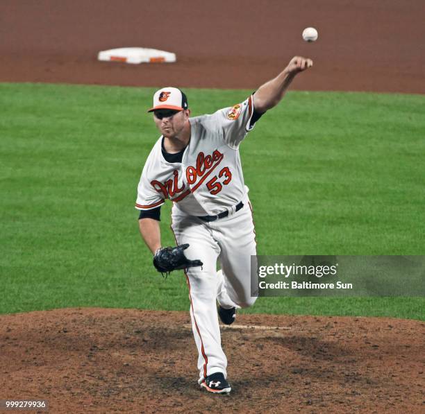 The Baltimore Orioles' Zach Britton pitches against the Boston Red Sox at Oriole Park at Camden Yards in Baltimore on June 12, 2018.