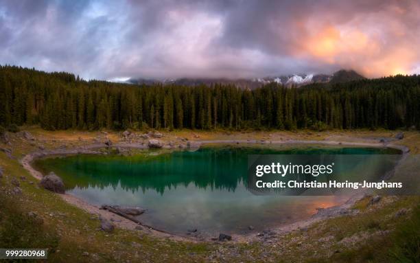 lago di carezza - lago reflection stock pictures, royalty-free photos & images