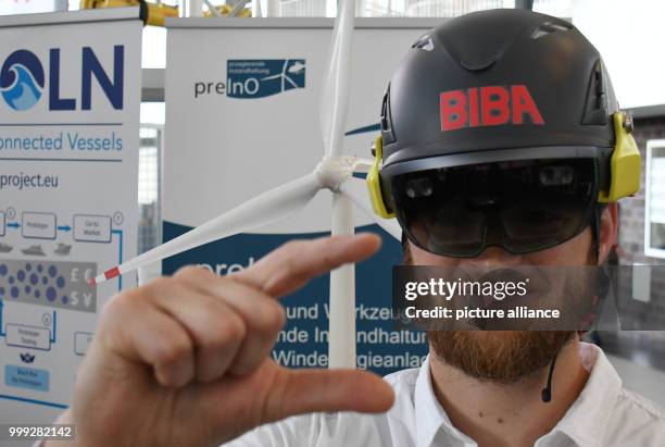 Moritz Quandt, research assistant at the Institut für Produktion und Logistik GmbH at the University of Bremen demonstrates working with the data...