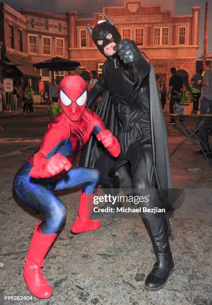 Spiderman and Batman pose at Concern Foundations's 44th Annual Block Party at Paramount Studios on July 14, 2018 in Hollywood, California.