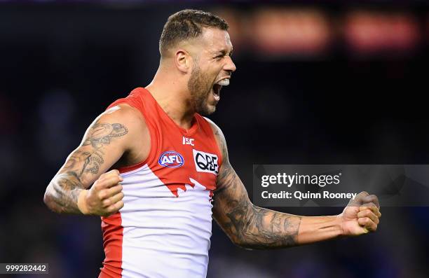 Lance Franklin of the Swans celebrates winning the round 17 AFL match between the North Melbourne Kangaroos and the Sydney Swans at Etihad Stadium on...