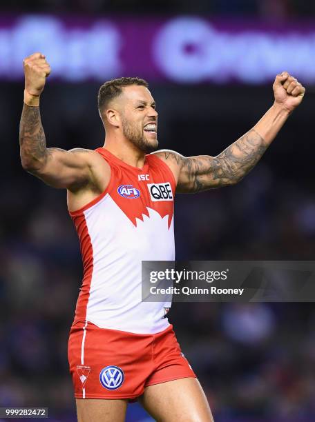 Lance Franklin of the Swans celebrates winning the round 17 AFL match between the North Melbourne Kangaroos and the Sydney Swans at Etihad Stadium on...