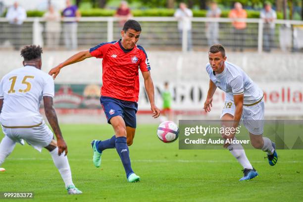 Junior Alonso Mujica of Lille and Remi Oudin of Reims during the friendly match between Lille and Reims on July 14, 2018 in St Quentin, France.