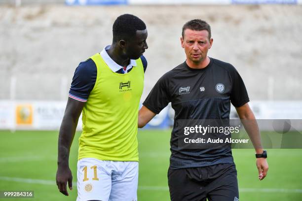 Grejohn Kyei and assistant coach Stephane Dumont of Reims during the friendly match between Lille and Reims on July 14, 2018 in St Quentin, France.