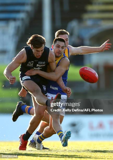 Samuel Fisher of the Blues kicks the ball during the round 15 VFL match between the Northern Blues and Williamstown Seagulls at Ikon Park on July 15,...