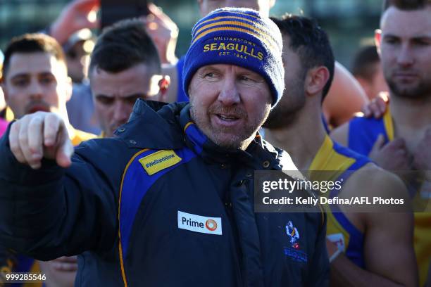 Andrew Collins senior coach of the Seagulls speaks to players during the round 15 VFL match between the Northern Blues and Williamstown Seagulls at...