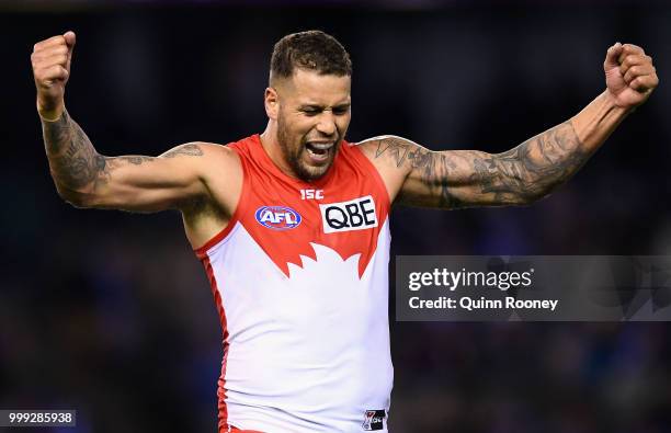 Lance Franklin of the Swans celebrates winning the round 17 AFL match between the North Melbourne Kangaroos and the Sydney Swans at Etihad Stadium on...