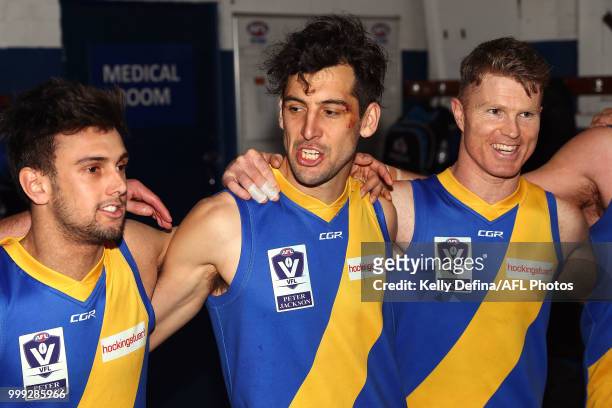 Leigh Masters of the Seagulls and team mates sing the song after the Seagulls victory during the round 15 VFL match between the Northern Blues and...