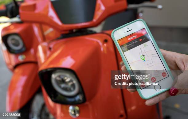 The app for rental of electric scooters being shown during a press conference on the start of the Electric Scooter Sharing program in Munich,...