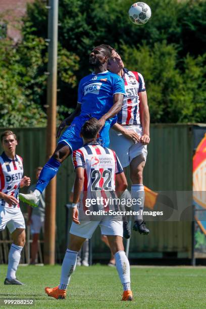 Peter Olayinka of KAA Gent, Dylan Ryan of Willem II during the match between Willlem II v KAA Gent on July 14, 2018 in TILBURG Netherlands