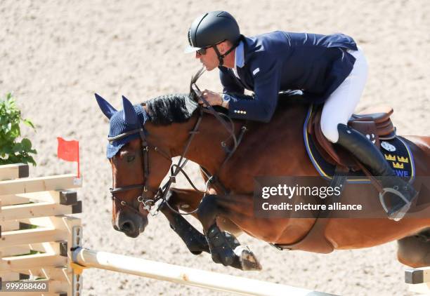 Swedish show jumper Peder Fredericson on his horse H&M All In at the Longines FEI European Championships 2017 in Gothenburg, Sweden, 23 August 2017....