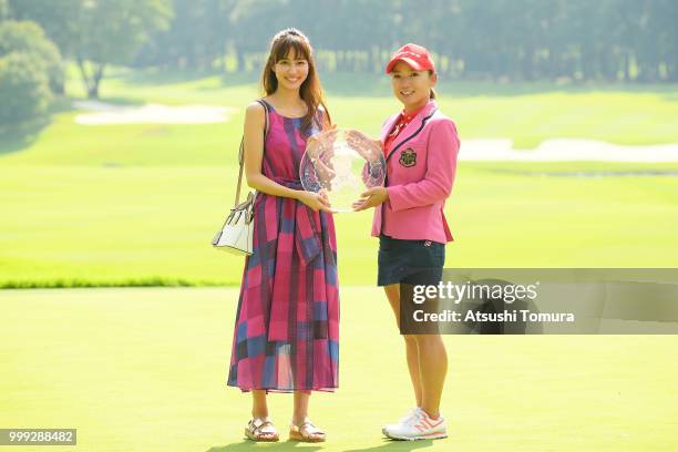 Chie Arimura of Japan poses with Chiemi Aiko of Japan after winning the Samantha Thavasa Girls Collection Ladies Tournament at the Eagle Point Golf...