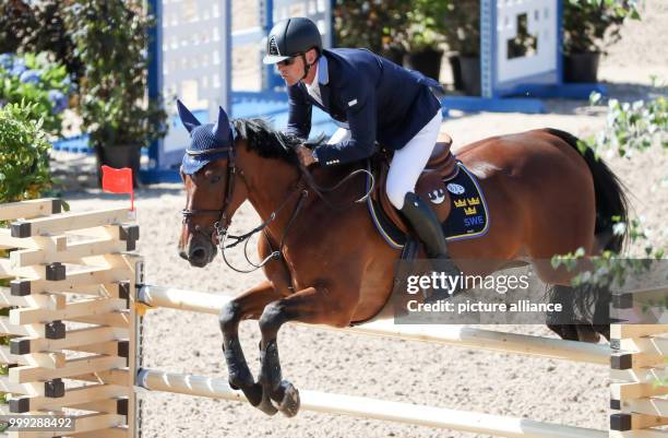 Swedish show jumper Peder Fredericson on his horse H&M All In at the Longines FEI European Championships 2017 in Gothenburg, Sweden, 23 August 2017....