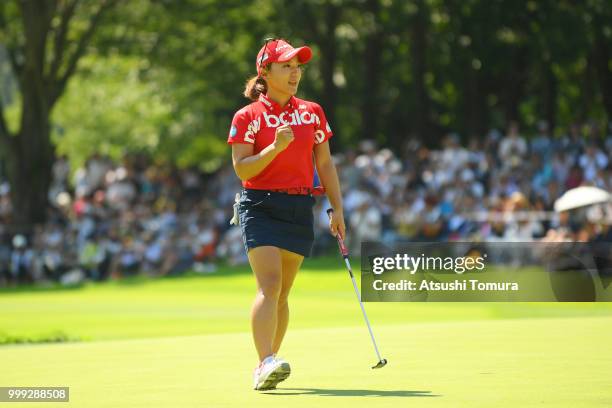 Chie Arimura of Japan celebrates after making her birdie putt on the 18th hole during the final round of the Samantha Thavasa Girls Collection Ladies...