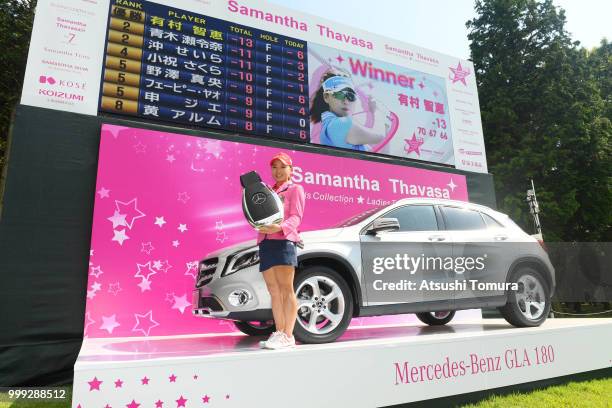 Chie Arimura of Japan poses with the prize car after winning the Samantha Thavasa Girls Collection Ladies Tournament at the Eagle Point Golf Club on...