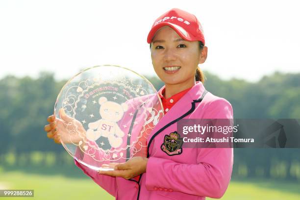 Chie Arimura of Japan poses after winning the Samantha Thavasa Girls Collection Ladies Tournament at the Eagle Point Golf Club on July 15, 2018 in...