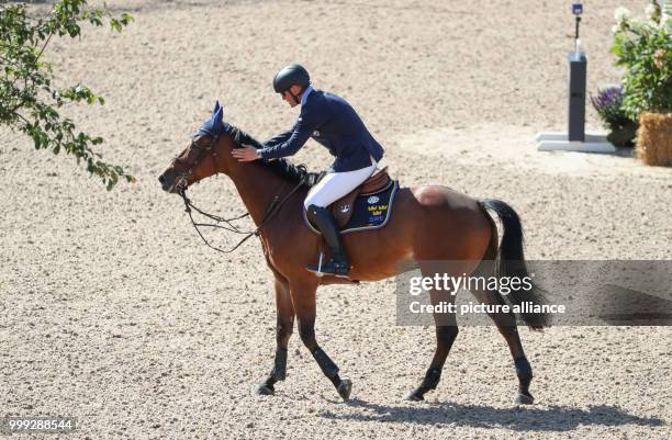 Swedish show jumper Peder Fredericson on his horse H&M All In at the Longines FEI European Championships 2017 in Gothenburg, Sweden, 23 August 2017....