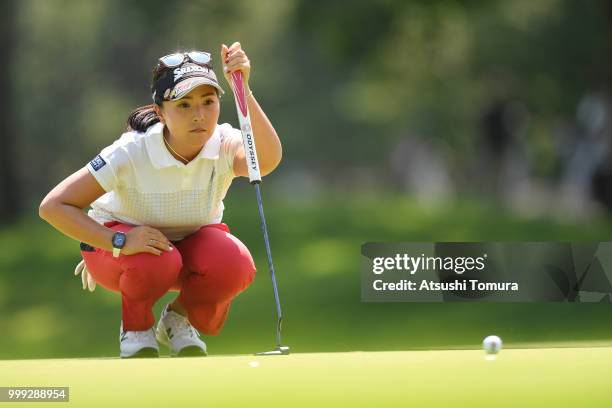 Serena Aoki of Japan lines up her putt on the 15th hole during the final round of the Samantha Thavasa Girls Collection Ladies Tournament at the...