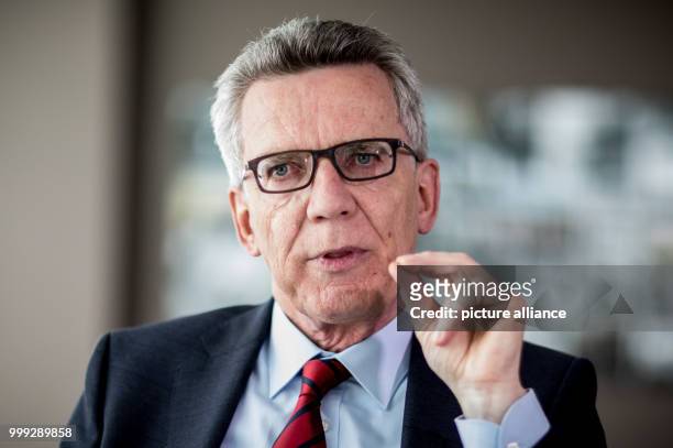 German Interior Minister Thomas de Maiziere pictured during an interview in Berlin, Germany, 23 August 2017. Photo: Michael Kappeler/dpa