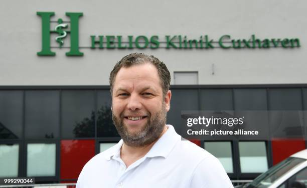 Manuel-Georg Burkert, chief physician for intensive, emergency and palliative medicine, outside the main entrance to the Hellios Klinik in Cuxhaven,...