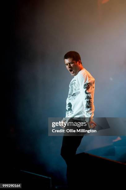 George Pettit of Alexisonfire performs onstage headlining the mainstage replacing Avenged Sevenfold who pulled out due to illness on day 8 of the...