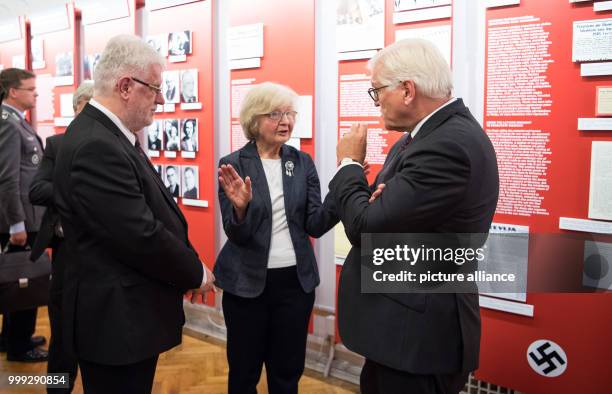 German President Frank-Walter Steinmeier is shown around the Museum of the Occupation of Latvia 1940-1991 by advisory board member Dzintra Bungs and...