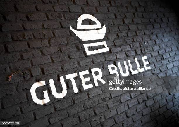 Lettering reads "Guter Bulle" on the wall of a burger restaurant of the same name in Frankfurt am Main, Germany, 23 August 2017. The small burger...