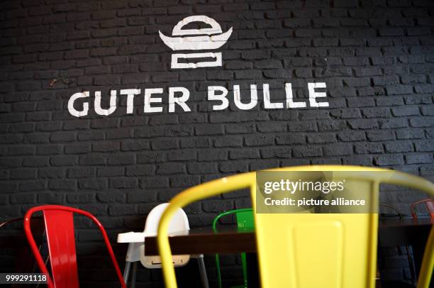 Lettering reads "Guter Bulle" on the wall of a burger restaurant of the same name in Frankfurt am Main, Germany, 23 August 2017. The small burger...