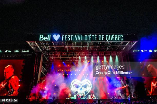 Chris Steele, Dallas Green, George Pettit, Jordan Hastings and Wade MacNeil of Alexisonfire perform onstage headlining the mainstage replacing...