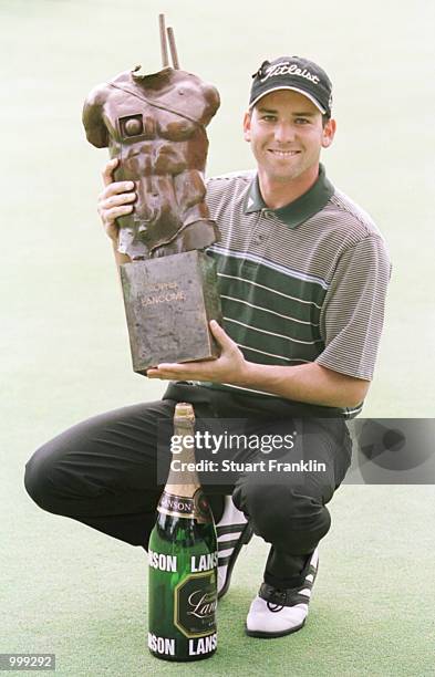 Sergio Garcia of Spain Celebrates with the Lancome Trophy after sinking a two foot putt on the last hole to win at the St-Nom-la-Breteche Golf Club,...