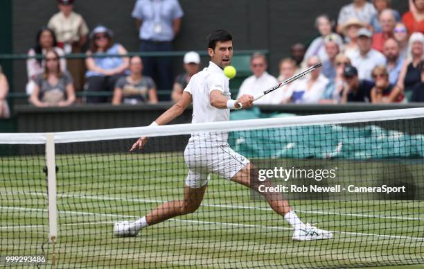 Novak Djokovic during his match against Rafael Nadal in their Men's Semi-Final match at All England Lawn Tennis and Croquet Club on July 14, 2018 in...