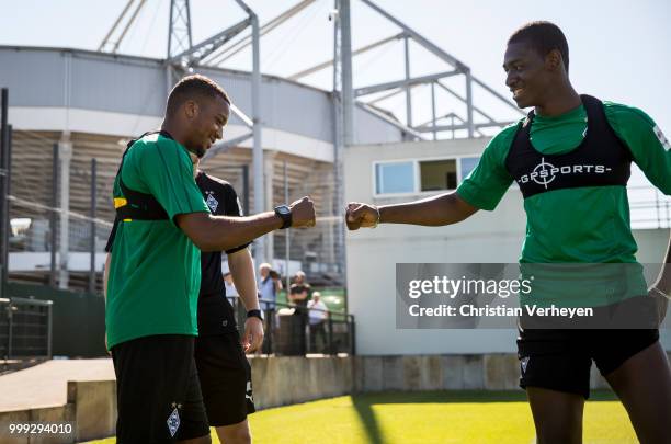 Alassane Plea and Mamadou Doucoure during a training session of Borussia Moenchengladbach at Borussia-Park on July 15, 2018 in Moenchengladbach,...