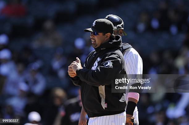 Manager Ozzie Guillen of the Chicago White Sox makes a pitching change during the game against the Toronto Blue Jays on May 9, 2010 at U.S. Cellular...