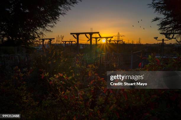 industrial sunset - spreading mayo stock pictures, royalty-free photos & images