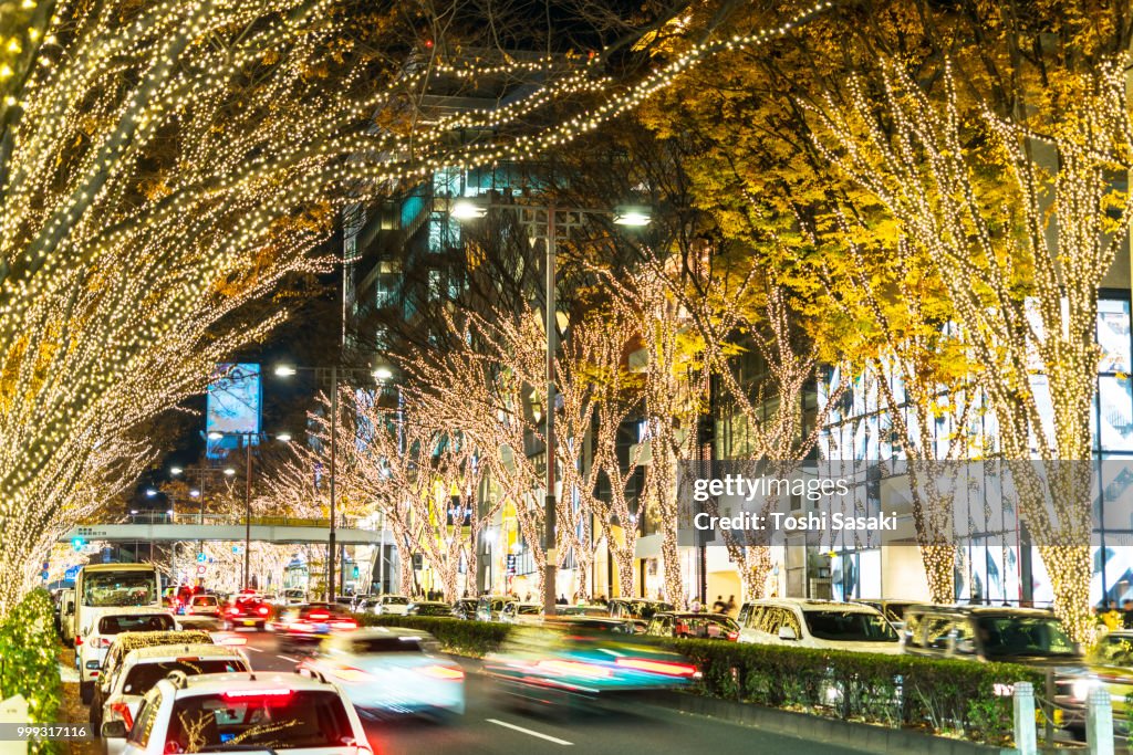 Cars go through among the illuminated tree lined Omotesadndo Street for winter holydays season in the night at Jingumae, Shibuya Tokyo Japan on December 05 2017.