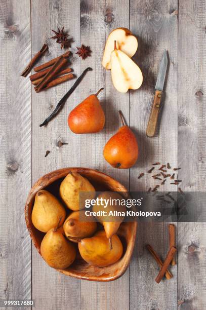 pears and spices - ingredients fot sweet dessert on the wooden t - alina stockfoto's en -beelden